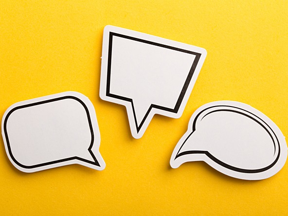 White speech bubbles on a yellow background